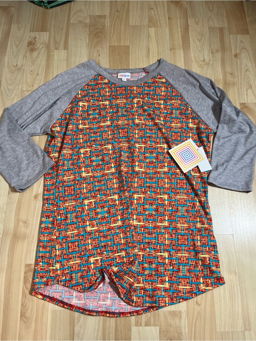 LuLaRoe Randy Baseball T-Shirt a geometric pattern on the body New Size Medium